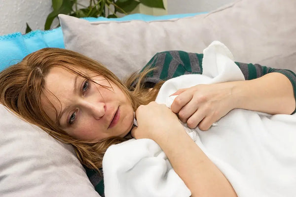Fatigue and Sweating After COVID: Causes and What to Know